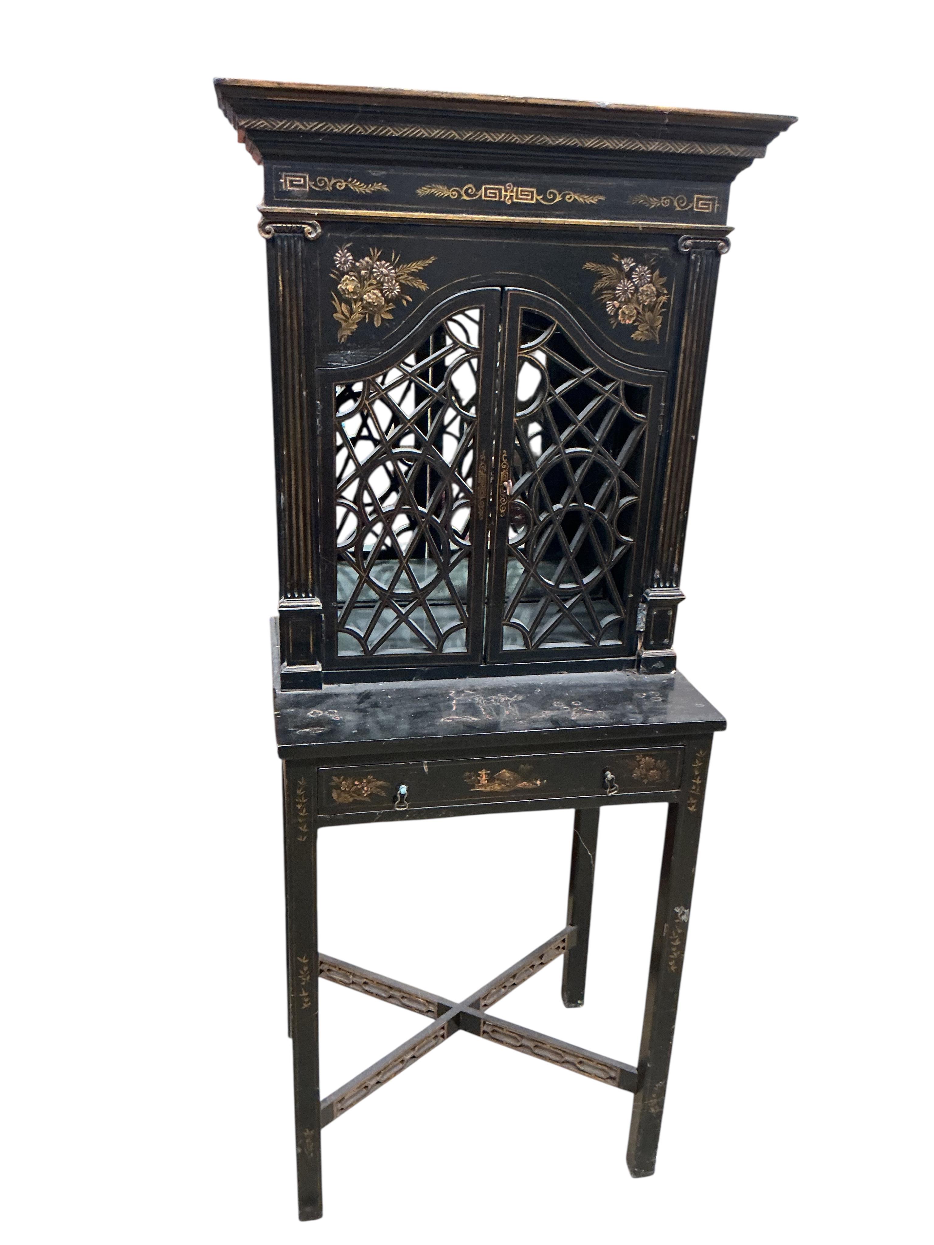 A chinoiserie lacquer cabinet on stand, width 63cm, depth 31cm, height 147cm